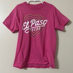 This is a hot pink top, size M, from ‘Delta Pro Weight’